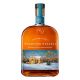 Woodford Reserve’s annual holiday bottle featuring a snowy distillery scene